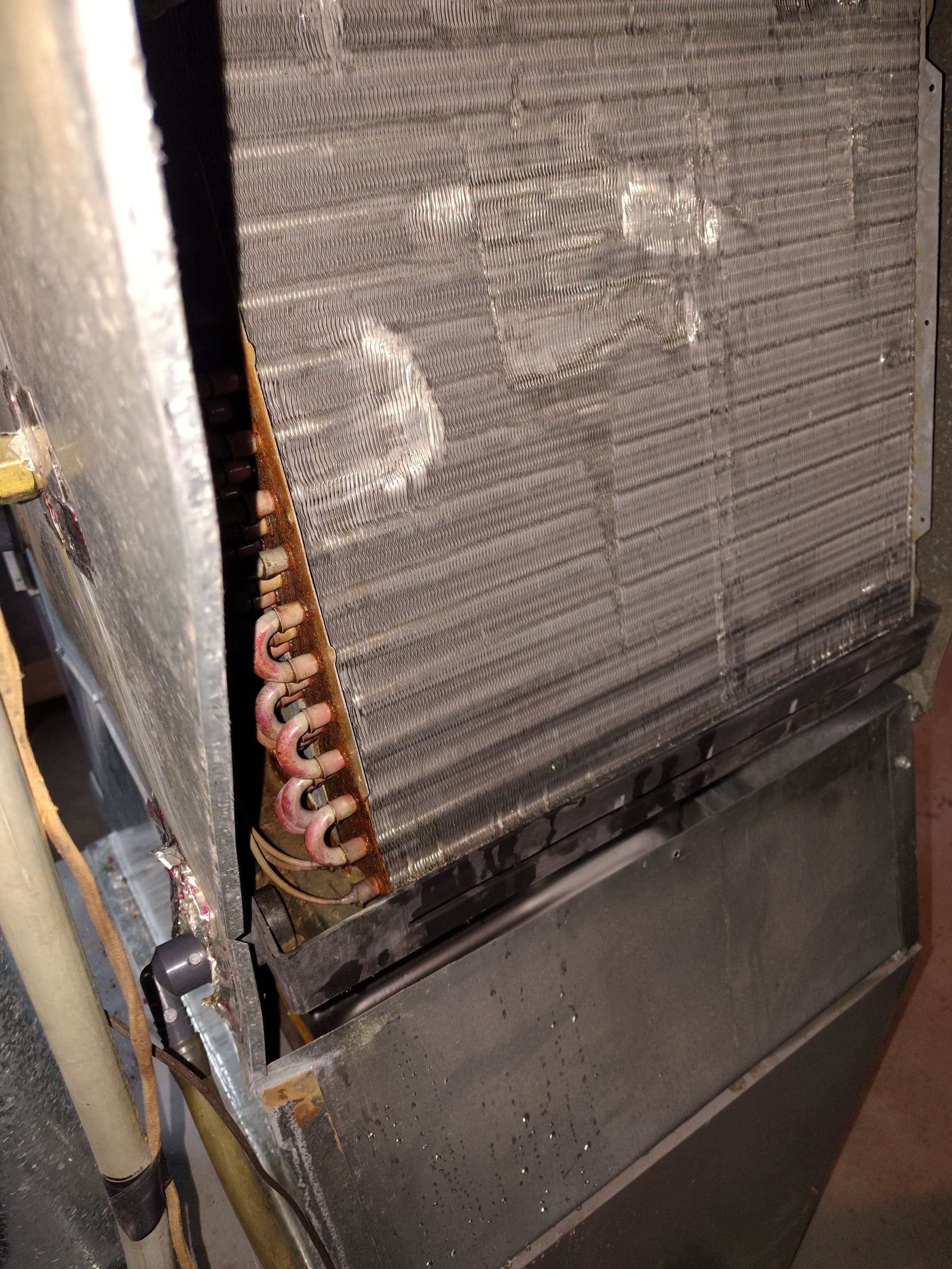 Gallery photos for AC Leaking Water? A Clogged Drain Pan Could Be Why: Image #1